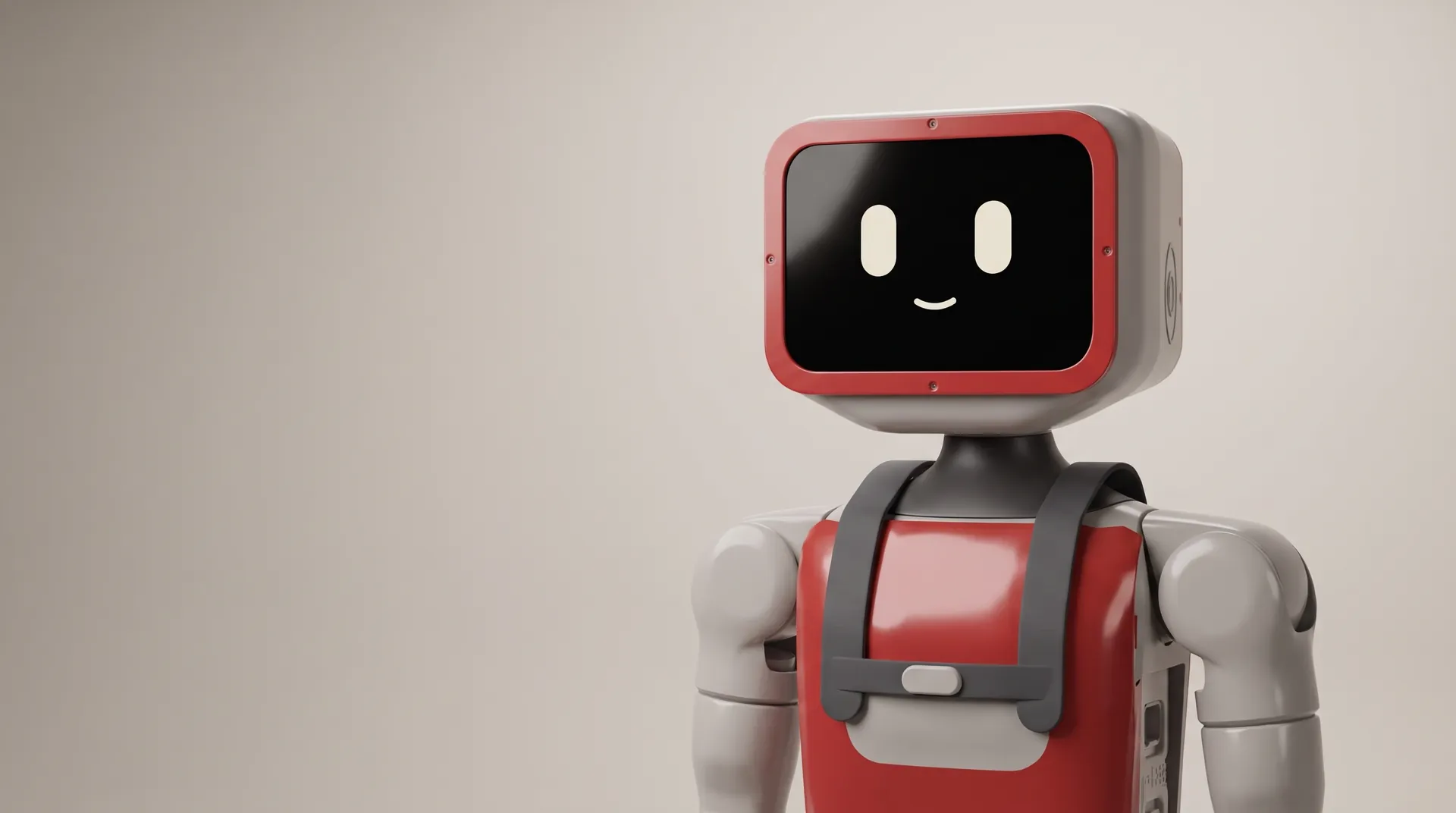 Milo, a humanoid robot with a boxy ivory head and a red-framed display face showing two eyes and a smile, wearing a red chest panel and dark harness straps, in a softly lit studio.